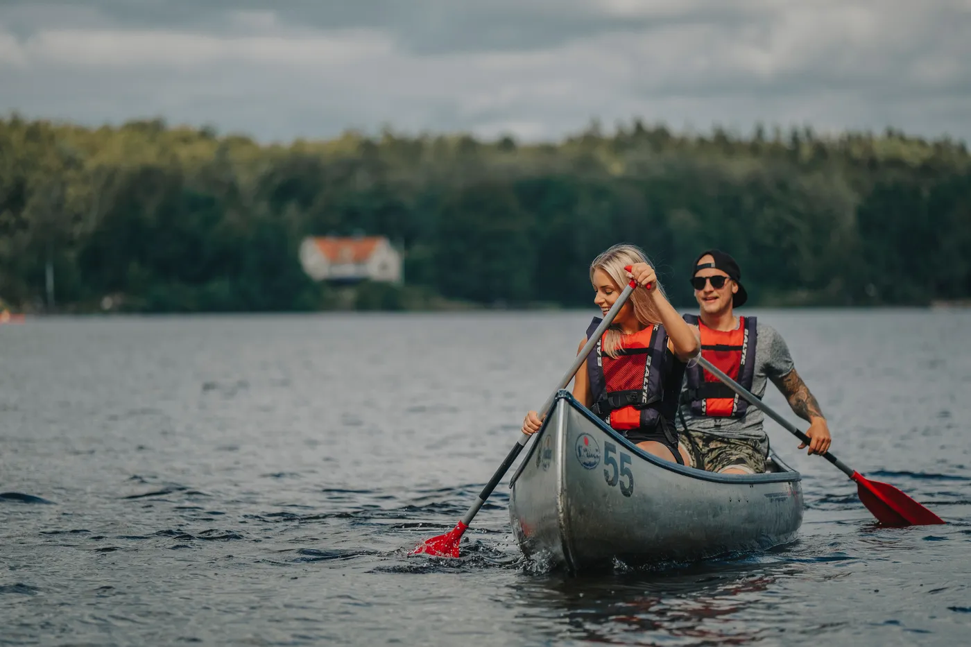 Young couple canoeing on lake Immeln