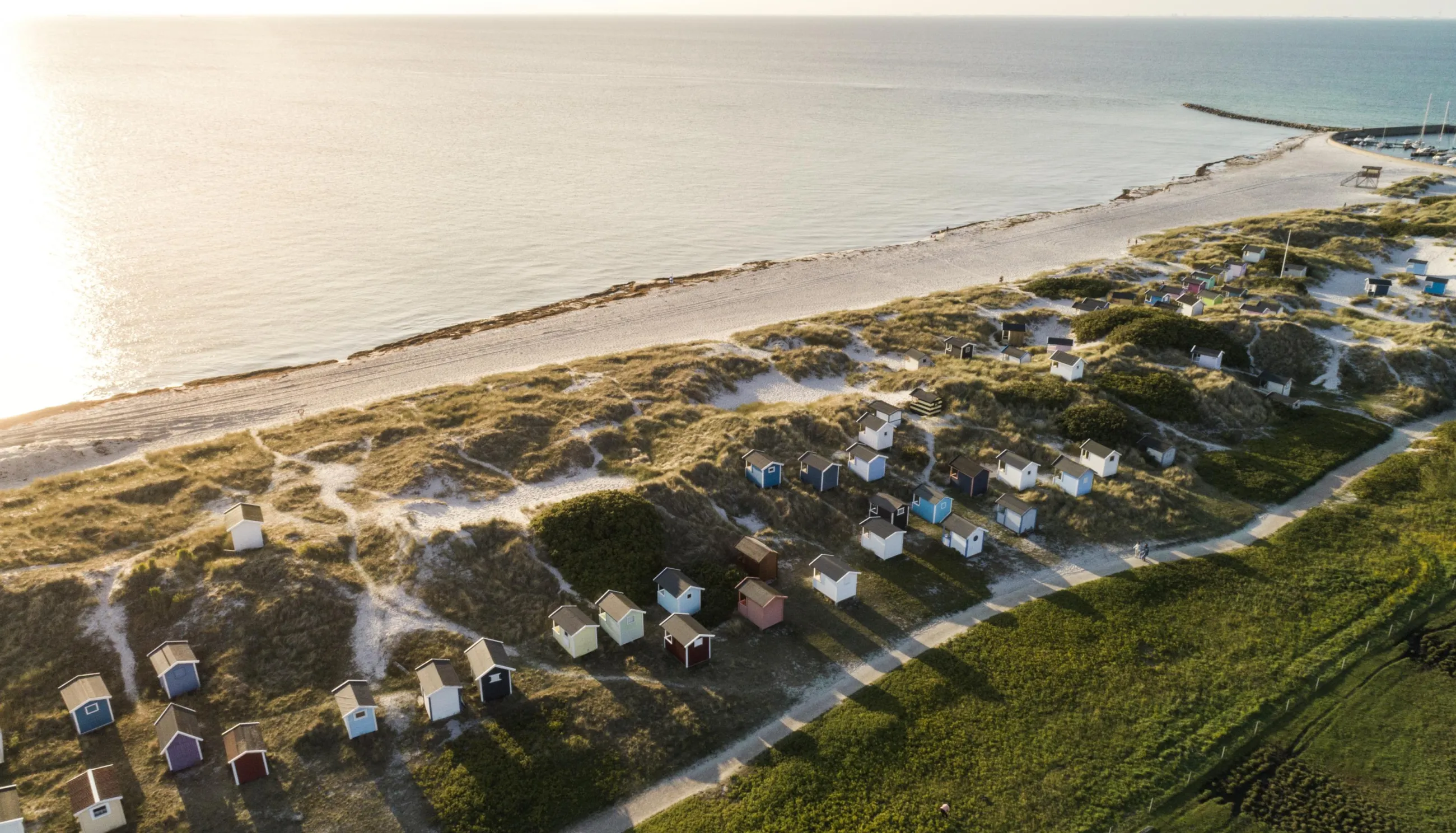 View of beach cabins from above at Skanör beach early in the morning