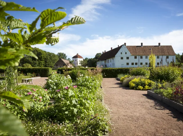 Castle Garden with a gravel path and white castle in the background