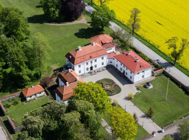 Bjärsjölagård's castle seen from above surrounded by nature