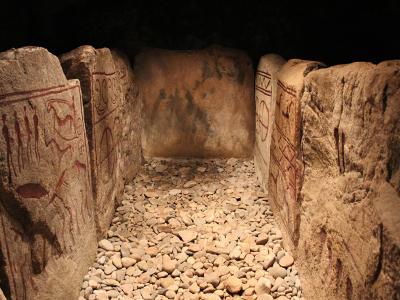 The Inside of a royal viking tomb in Kivik surrounded with rune stones