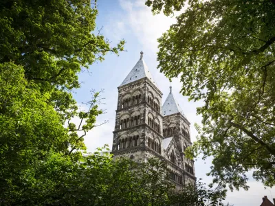 View over the Lund Cathedral through the green tree tops